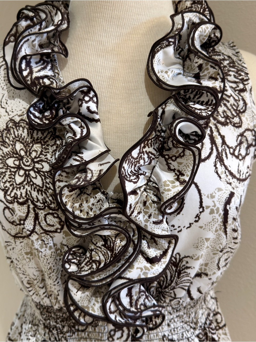 Women's Sleevless Brown and White floral pattern Ruffled Blouse